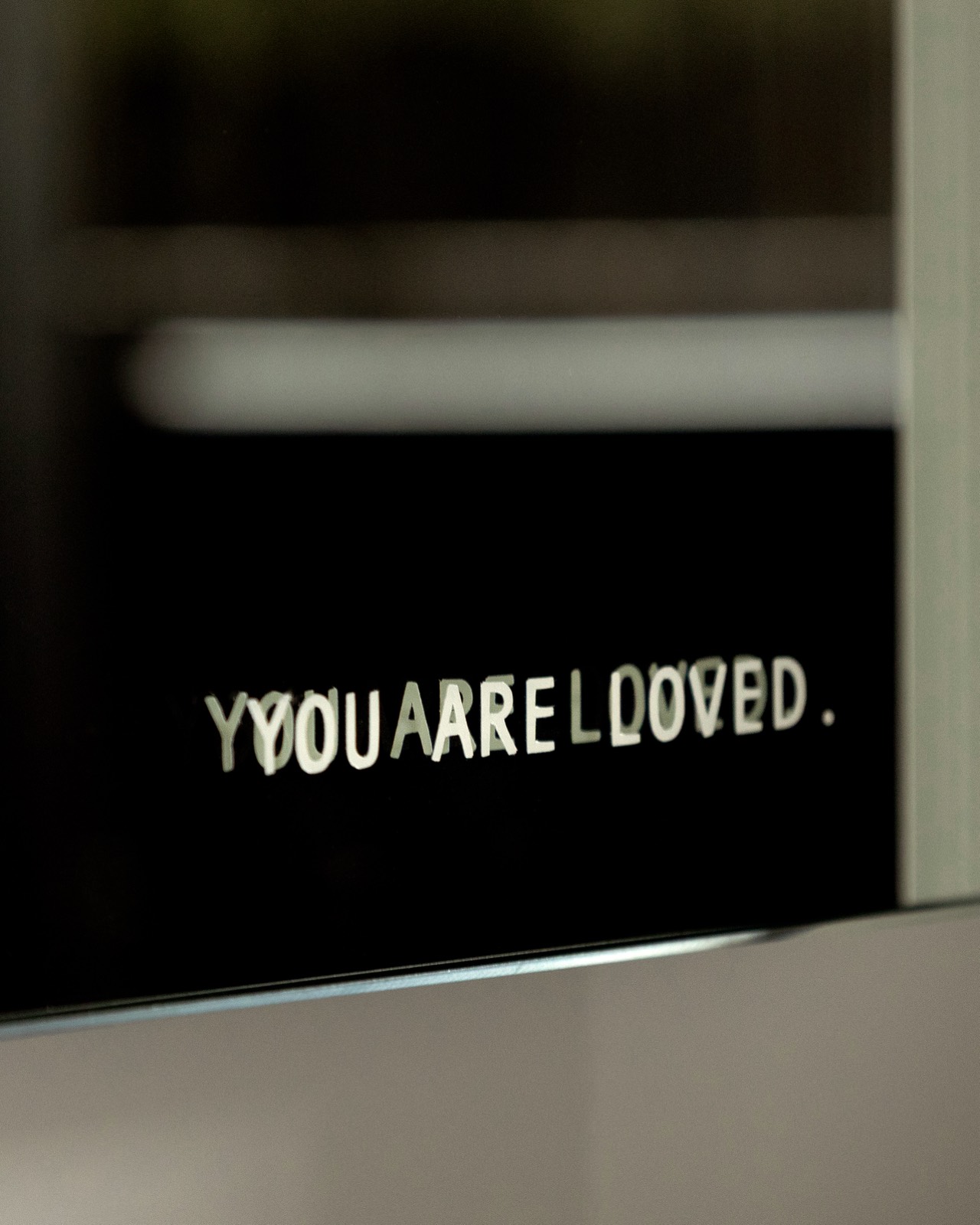 Engraved detail reading you are loved